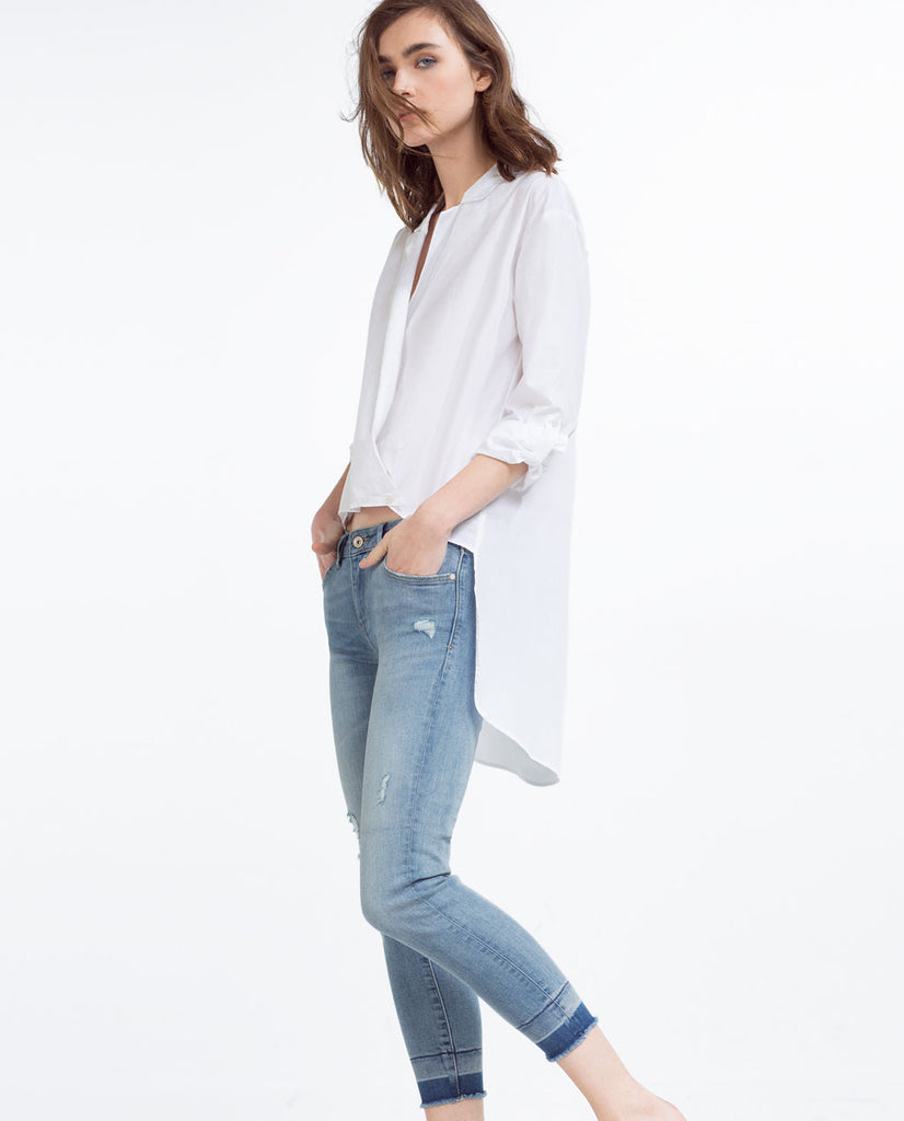 MID-RISE FRAYED HEM JEANS